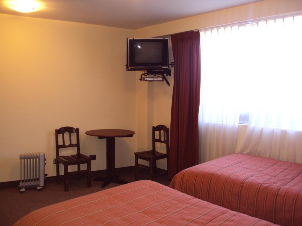 Mosoq Inn Puno Cameră foto